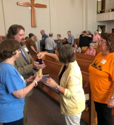 Receiving communion at a Presbytery Assembly Meeting